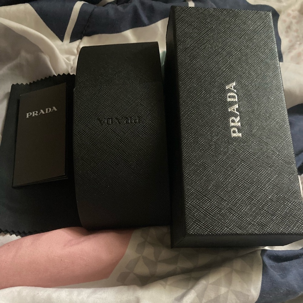 PRADA SUNGLASSES PROVIDED WITH CASE AND AUTHENTICATION CARD